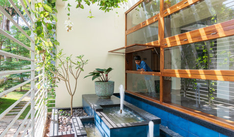 Thrissur Houzz: A Home Designed Around Skylights & Courtyards