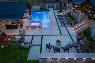 Example of a large trendy backyard pool design in Toronto