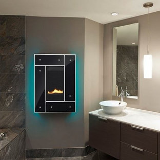 Immagine di un piccolo soggiorno minimal con pareti grigie e pavimento in gres porcellanato