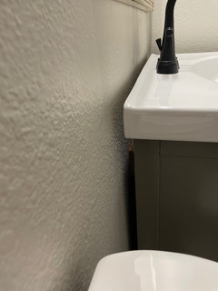 HELP! Issue with vanity not being flush against wall