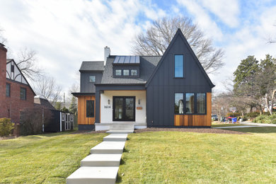 Mid-sized contemporary black two-story mixed siding and board and batten exterior home idea in DC Metro with a mixed material roof and a black roof