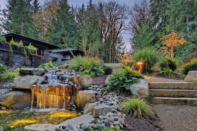 Inspiration for a river rock waterfall in Seattle.