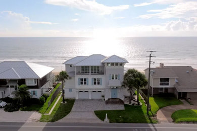 Inspiration for a coastal exterior home remodel in Jacksonville