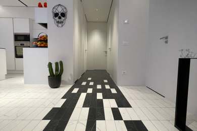 Foto di un soggiorno design con pavimento in gres porcellanato