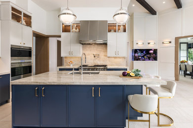 Kitchen - large transitional beige floor kitchen idea in Miami with a single-bowl sink, shaker cabinets, blue cabinets, quartzite countertops, beige backsplash, an island and blue countertops