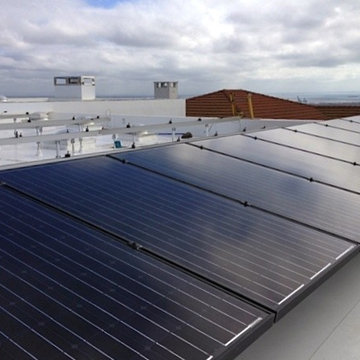 Solar system install over a SIngle-Ply IB Cool Roofing System - San Pedro, CA
