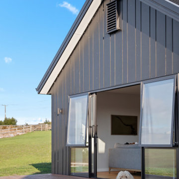 Modern Black Kiwi Barn Home