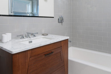 Example of a transitional bathroom design in Other