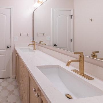 Playful Guest Bath Remodel with Fun Tile and Mixed Metals