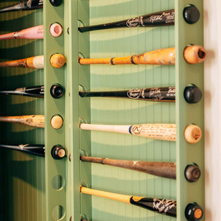Photo of a medium sized traditional enclosed home cinema in Phoenix with grey walls, brick flooring and a built-in media unit.