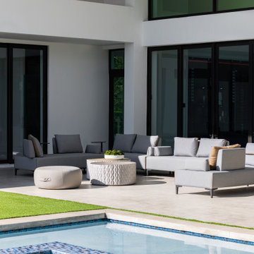 Backyard of a Modern House With Sitting Area and Pool