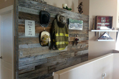 Inspiration for a small rustic hallway remodel in Denver with beige walls