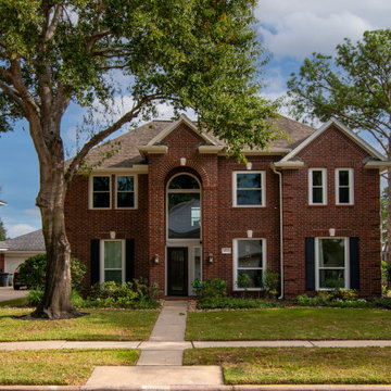 Re-side and gutters of mid-90's 2 story house in Houston, TX