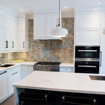 Caesarstone Countertops, Built In Range Hood, Stainless Faucet