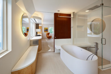 This is an example of a contemporary bathroom in DC Metro with a freestanding tub.