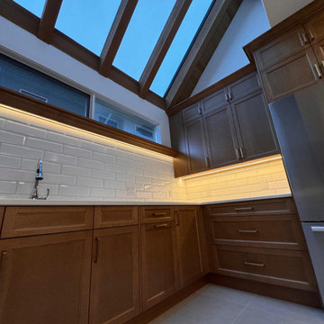 Sunlit Kitchen with Warm Wood Shaker Cabinetry