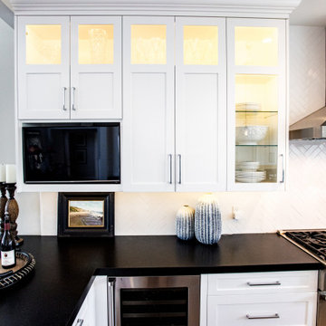 Custom handcrafted kitchen cabinetry, white painted shaker style coastal design