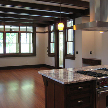 White walls with dark wood trim in the kitchen