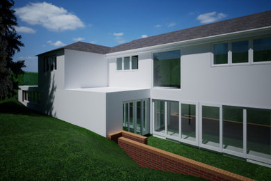 Photo of a medium sized modern bungalow render house exterior in West Midlands.