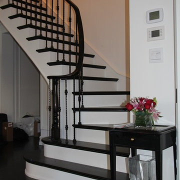 L shaped with long steep curved handrail