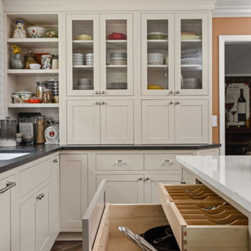 Warm Traditional Kitchen Remodel with Cream Cabinets & Herringbone Floors