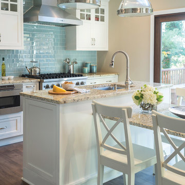 White Cabinets and Blue Subway Tile