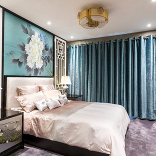 Immagine di una camera matrimoniale etnica con pareti grigie, moquette, nessun camino e pavimento grigio