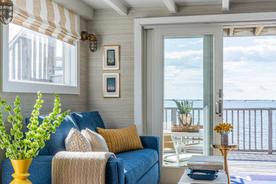 Inspiration for a small nautical living room in Boston with beige walls, wallpapered walls, dark hardwood flooring, brown floors and exposed beams.