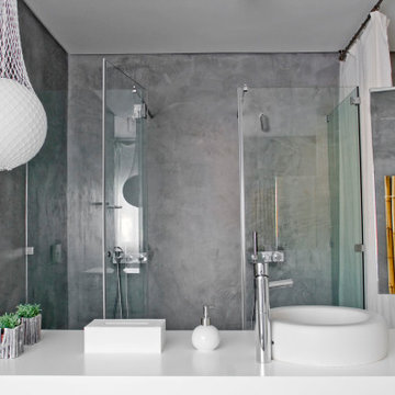 Bathroom with Central Bathtub and Linear Fireplace