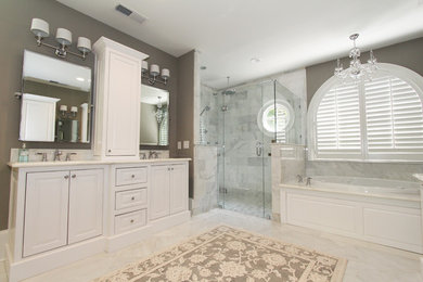 Bathroom - huge traditional master white tile and stone tile marble floor bathroom idea in Atlanta with an undermount sink, white cabinets, marble countertops, a two-piece toilet and gray walls