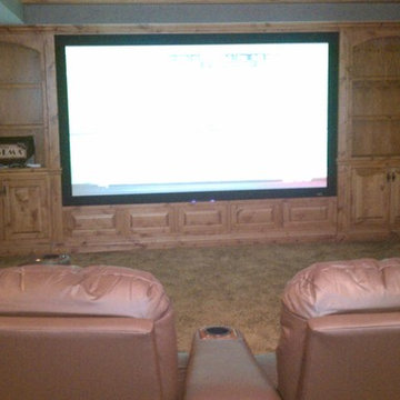 Speakers Behind Screen
