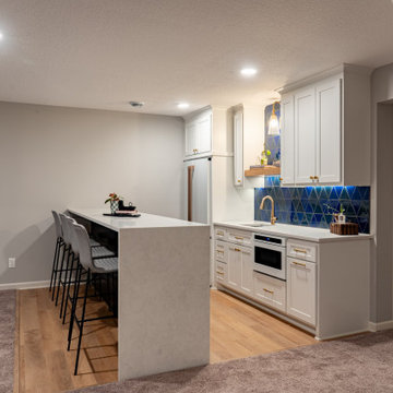 Bold Basement Finish — Linear Gas Fireplace, Wet Bar & Cafe Appliance Suite