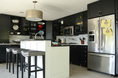 Large minimalist l-shaped ceramic tile and beige floor open concept kitchen photo in New York with an undermount sink, shaker cabinets, dark wood cabinets, quartz countertops, metallic backsplash, matchstick tile backsplash, stainless steel appliances and an island