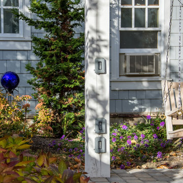 Posh Porte-cochère with Backyard Pergola & Bench Swing