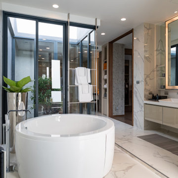 Large Modern Bathroom With Bathtub and Sink