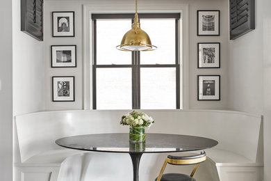 Inspiration for a transitional dark wood floor and brown floor dining room remodel in Chicago with gray walls