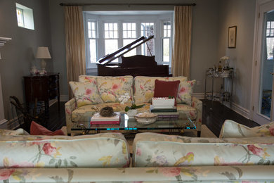 Example of a large classic formal and enclosed dark wood floor living room design in Toronto with blue walls, a standard fireplace and a stone fireplace