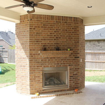 Patio Cover, Outdoor Kitchen, Fireplace, and Water Feature in Cross Creek Ranch