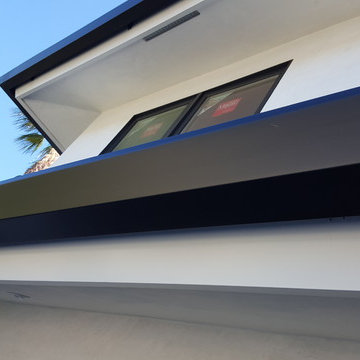 Huntington Beach California, White Fascia Wrap, Black 6 inch Angle Face Gutters