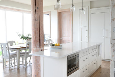 Example of a beach style kitchen design in Vancouver