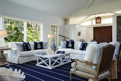 Inspiration for a mid-sized coastal formal and open concept dark wood floor and brown floor living room remodel in Miami with gray walls, no fireplace and no tv
