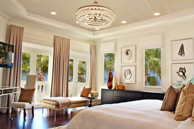 Inspiration for a mid-sized contemporary master bedroom in Miami with white walls and dark hardwood floors.
