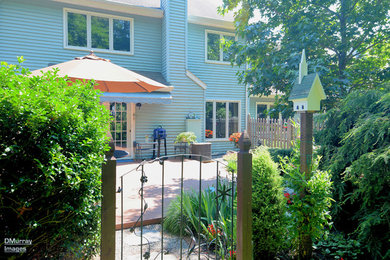 Patio - transitional patio idea in Other
