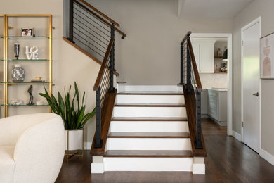 Mid-sized transitional wooden l-shaped wood railing staircase photo in San Francisco with wooden risers