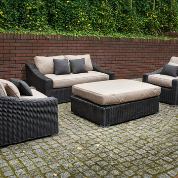Toja Patio Furniture - Tuscan Love Seat Set - Red Brick Wall