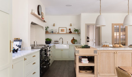 Pale Green and Oak Kitchen With a Hidden Pantry