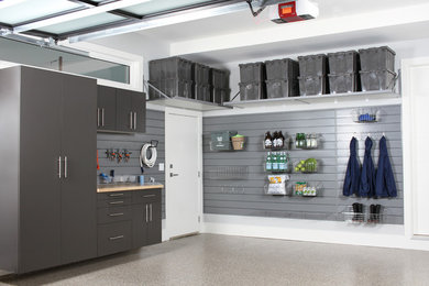 Garage - mid-sized modern two-car garage idea in Vancouver