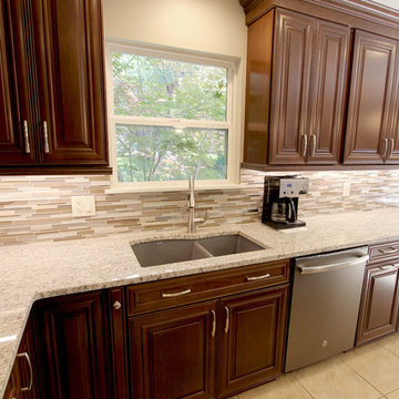 Waypoint Cherry Chocolate Cabinets and Giallo Ornamental Granite Countertops