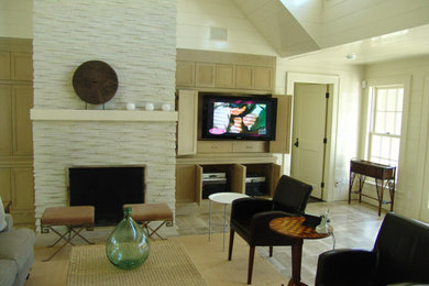 Example of a large transitional open concept beige floor and ceramic tile living room design in New York with white walls, a standard fireplace, a stone fireplace and a media wall