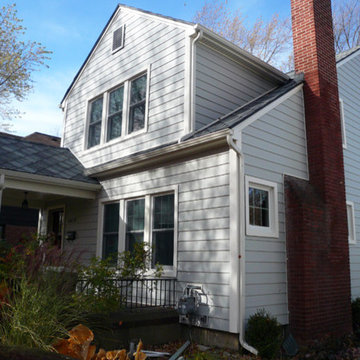 26 New Composite Widows, Green Composite Siding and New Gutters Too!